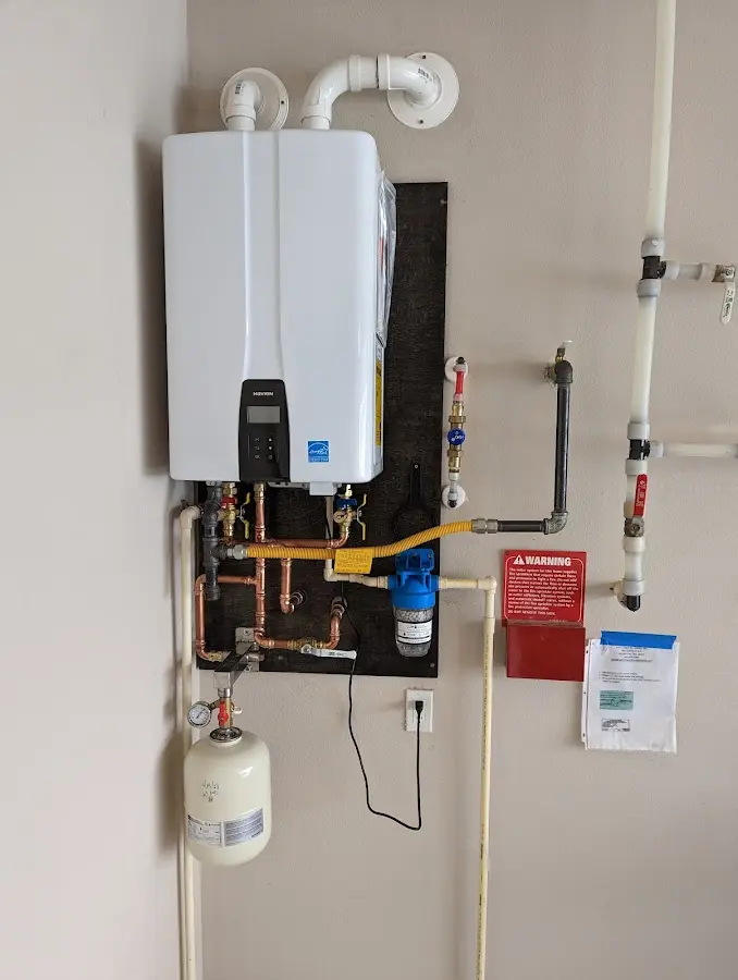 Professional plumber installing copper piping in a Silver Springs Shores home